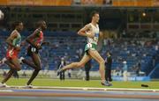 25 August 2004; Ireland's Alastair Cragg leads Kenya's Abraham Chebii (8) and 10000m gold medallist Kenenisa Bekele (18) during his heat of the Men's 5000m. Olympic Stadium. Games of the XXVIII Olympiad, Athens Summer Olympics Games 2004, Athens, Greece. Picture credit; Brendan Moran / SPORTSFILE