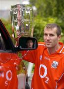 1 September 2004; Cork captain Ben O'Connor with Kilkenny captain Martin Comerford, left, at a media conference ahead of the All-Ireland hurling final. The winners get aToyota Corolla and the runners up get a Toyota Yaris as part of Toyota's status as &quot;Official Car to the GAA&quot;. Toyota Motor Centre, Ballsbridge, Dublin. Picture credit; Brendan Moran / SPORTSFILE