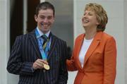 1 September 2004; President of Ireland, Mary McAleese greets Irish showjumper and Gold Medalist Cian O'Connor at a reception, held in Aras an Uachtarain, in honour of the Irish Olympic team who competed at the 2004 Olympic Games in Athens recently. Picture credit; Brendan Moran / SPORTSFILE