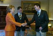 1 September 2004; President of Ireland, Mary McAleese greets Irish boxer Andy Lee, in the company of Irish Chef de Mission William O'Brien, at a reception, held in Aras an Uachtarain, in honour of the Irish team's achievements at the 2004 Olympic Games in Athens recently. Picture credit; Brendan Moran / SPORTSFILE