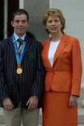 1 September 2004; President of Ireland, Mary McAleese greets Irish showjumper and Gold Medallist Cian O'Connor at a reception, held in Aras an Uachtarain, in honour of the Irish team's achievement at the 2004 Olympic Games in Athens recently. Picture credit; Brendan Moran / SPORTSFILE