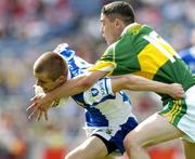29 August 2004; Danny Reddin, Laois, in action against Colin O'Mahony, Kerry. All-Ireland Minor Football Championship Semi-Final, Kerry v Laois, Croke Park, Dublin. Picture credit; Ray McManus / SPORTSFILE