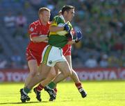 29 August 2004; Declan O'Sullivan, Kerry, in action against Fergal Doherty, Derry. Bank of Ireland Senior Football Championship Semi-Final, Derry v Kerry, Croke Park, Dublin. Picture credit; Ray McManus / SPORTSFILE