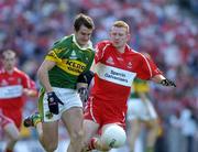 29 August 2004; Eoin Brosnan, Kerry, in action against Fergal Doherty, Derry. Bank of Ireland Senior Football Championship Semi-Final, Derry v Kerry, Croke Park, Dublin. Picture credit; Ray McManus / SPORTSFILE