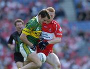 29 August 2004; Eoin Brosnan, Kerry, in action against Fergal Doherty, Derry. Bank of Ireland Senior Football Championship Semi-Final, Derry v Kerry, Croke Park, Dublin. Picture credit; Ray McManus / SPORTSFILE