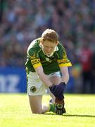 29 August 2004; Colm Cooper, Kerry, stretches during the game. Bank of Ireland Senior Football Championship Semi-Final, Derry v Kerry, Croke Park, Dublin. Picture credit; Ray McManus / SPORTSFILE