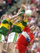 29 August 2004; Niall McCusker, Derry, in action against Dara O'Cinneide, left, and Mike Frank Russell, Kerry. Bank of Ireland Senior Football Championship Semi-Final, Derry v Kerry, Croke Park, Dublin. Picture credit; Ray McManus / SPORTSFILE