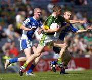 29 August 2004; Killian Young, Kerry, in action against Shane O'Neill, left, and Donal Brennan, Laois. All-Ireland Minor Football Championship Semi-Final, Kerry v Laois, Croke Park, Dublin. Picture credit; Brian Lawless / SPORTSFILE