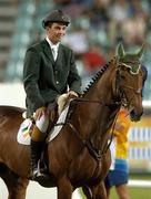 27 August 2004; Ireland's Cian O'Connor with Waterford Crystal after winning the Individual Jumping Competition. Markopoulo Olympic Equestrian Centre. Games of the XXVIII Olympiad, Athens Summer Olympics Games 2004, Athens, Greece. Picture credit; Brendan Moran / SPORTSFILE