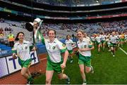 29 September 2013; Offaly captain Siobhan Flannery celebrates with the West County Hotel cup after the game. TG4 All-Ireland Ladies Football Junior Championship Final, Offaly v Wexford, Croke Park, Dublin. Photo by Sportsfile