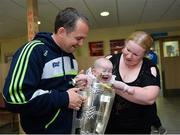 29 September 2013; Clare manager Davy Fitzgerald with 6 month old Emma Monahan and her mother Sinead, from Ballymote, Co. Sligo, and the Liam MacCarthy cup on a visit by the All-Ireland Senior Hurling Champions to Our Lady's Hospital for Sick Children, Crumlin. Picture credit: Matt Browne / SPORTSFILE