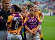 29 September 2013; Dejected Wexford players, including Catriona McCabe, 6, and Ellen O'Brien, after the game. TG4 All-Ireland Ladies Football Junior Championship Final, Offaly v Wexford, Croke Park, Dublin. Photo by Sportsfile