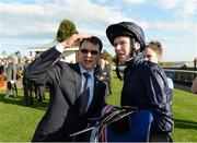 29 September 2013; Trainer Aiden O'Brien and jockey Joseph O'Brien after winning the Juddmonte Beresford Stakes with Geoffrey Chaucer. Curragh Racecourse, The Curragh, Co. Kildare. Picture credit: Matt Browne / SPORTSFILE