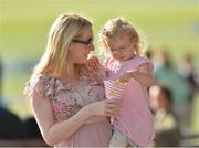 29 September 2013; Adrienne Keaveney with, 3 year old, Amy, from Drumcondra, Dublin, enjoying popcorn at the Curragh Racecourse, Co. Kildare. Picture credit: Matt Browne / SPORTSFILE