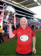 29 September 2013; Cork manager Eamonn Ryan celebrates with the Brendan Martin cup. TG4 All-Ireland Ladies Football Senior Championship Final, Cork v Monaghan, Croke Park, Dublin. Picture credit: Ray McManus / SPORTSFILE