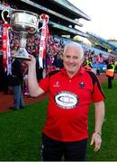 29 September 2013; Cork manager Eamonn Ryan celebrates with the Brendan Martin cup. TG4 All-Ireland Ladies Football Senior Championship Final, Cork v Monaghan, Croke Park, Dublin. Photo by Sportsfile