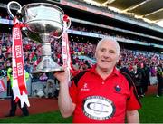 29 September 2013; Cork manager Eamonn Ryan celebrates with the Brendan Martin cup. TG4 All-Ireland Ladies Football Senior Championship Final, Cork v Monaghan, Croke Park, Dublin. Photo by Sportsfile