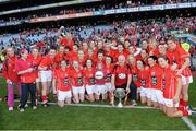 29 September 2013; Cork manager Eamonn Ryan and the team celebrate with the Brendan Martin cup after the game. TG4 All-Ireland Ladies Football Senior Championship Final, Cork v Monaghan, Croke Park, Dublin. Picture credit: Ray McManus / SPORTSFILE