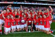 29 September 2013; Cork players and manager Eamonn Ryan celebrate with the Brendan Martin cup after the game. TG4 All-Ireland Ladies Football Senior Championship Final, Cork v Monaghan, Croke Park, Dublin. Photo by Sportsfile