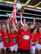 29 September 2013; Cork manager Eamonn Ryan celebrates with the Brendan Martin cup after the game. TG4 All-Ireland Ladies Football Senior Championship Final, Cork v Monaghan, Croke Park, Dublin. Photo by Sportsfile