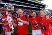 29 September 2013; Cork manager Eamonn Ryan, Geraldine O'Flynn and Angela Walsh, right, celebrate with the Brendan Martin cup after the game. TG4 All-Ireland Ladies Football Senior Championship Final, Cork v Monaghan, Croke Park, Dublin. Photo by Sportsfile