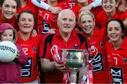 29 September 2013; Cork players and manager Eamonn Ryan celebrate with the Brendan Martin cup after the game. TG4 All-Ireland Ladies Football Senior Championship Final, Cork v Monaghan, Croke Park, Dublin. Photo by Sportsfile