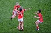 29 September 2013; Cork players, from left, Briege Corkery, Geraldine O'Flynn, Juliet Murphy and Doireann O'Sullivan celebrate after the game. TG4 All-Ireland Ladies Football Senior Championship Final, Cork v Monaghan, Croke Park, Dublin. Picture credit: Ray McManus / SPORTSFILE