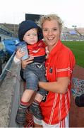 29 September 2013; Cork goalscorer Valerie Mulcahy celebrates with her 18-month-old godson Rian after the game. TG4 All-Ireland Ladies Football Senior Championship Final, Cork v Monaghan, Croke Park, Dublin. Picture credit: Ray McManus / SPORTSFILE