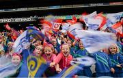 29 September 2013; Pupils of Scoil Uí Dhálaigh in Lexlip, Co. Kildare, cheer on both teams. TG4 All-Ireland Ladies Football Senior Championship Final, Cork v Monaghan, Croke Park, Dublin. Picture credit: Ray McManus / SPORTSFILE