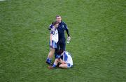 29 September 2013; Monaghan's Sharon Courtney, left, is comforted by Seamus McEnaney with Cathriona McConnell. TG4 All-Ireland Ladies Football Senior Championship Final, Cork v Monaghan, Croke Park, Dublin. Picture credit: Ray McManus / SPORTSFILE