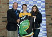 28 September 2013; Pat Quill, President, Ladies Gaelic Football Association, and Lynn Moynihan, from TESCO Ireland,  presents Eilish Gannon, Glenamaddy Williamstown Ladies G.A.A. Club, Co. Galway, team captain with the player of the match top after the Intermediate final, during the 2013 TESCO Ladies Football 7s, Intermediate final, Kilmacud Crokes GAA Club, Dublin v Glenamaddy Williamstown Ladies G.A.A. Club, Co. Galway. Naomh Mearnóg GAA Club, Portmarnock, Co. Dublin. Picture credit: Matt Browne / SPORTSFILE