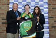 28 September 2013; Pat Quill, President, Ladies Gaelic Football Association, and Lynn Moynihan, from TESCO Ireland, present Sinead Cafferky, Kilmovee Shamrocks, Co Mayo, captain with the player of the match top after the win against Errigal Ciaran GAA Club, Co Tyrone, TESCO All-Ireland Ladies Football Club sevens senior shield final, during the 2013 TESCO Ladies Football 7s, Final, Kilmovee Shamrocks, Co Mayo v Errigal Ciaran GAA Club, Co Tyrone. Naomh Mearnóg GAA Club, Portmarnock, Co. Dublin. Picture credit: Matt Browne / SPORTSFILE