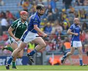 28 September 2013; Thomas Stapleton, Munster, in action against Lee Chin, Leinster, during a Super 11s Hurling Exhibition game. GAA Hurling All-Ireland Senior Championship Final Replay, Cork v Clare, Croke Park, Dublin. Picture credit: Ray McManus / SPORTSFILE