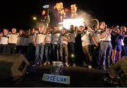 29 September 2013; The Liam MacCarthy cup sits on stage alongside a commemorative sign as Clare players celebrate on stage during the homecoming celebrations of the All-Ireland Senior Hurling Champions. Tim Smythe Park, Ennis, Co. Clare. Picture credit: Diarmuid Greene / SPORTSFILE