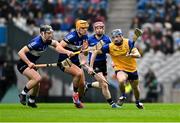 19 January 2025; Ciarán Stacey of Na Fianna in action against Bryan Murphy, left. and Luke Elliott of Sarsfields during the AIB GAA Hurling All-Ireland Senior Club Championship final match between Na Fianna and Sarsfields at Croke Park in Dublin. Photo by Daire Brennan/Sportsfile