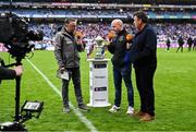 19 January 2025; Micheál Ó Domhnaill of TG4 interviews former Errigal Ciarán and Tyrone footballer Peter Canavan and RTÉ broadcaster and Cuala supporter Des Cahill, right, before the AIB GAA Football All-Ireland Senior Club Championship final match between Cuala and Errigal Ciarán at Croke Park in Dublin. Photo by Piaras Ó Mídheach/Sportsfile