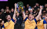 19 January 2025; Na Fianna players Ciarán Stacey, left, and Liam Stacey lift the Tommy Moore Cup after their side's victory in the the AIB GAA Hurling All-Ireland Senior Club Championship final match between Na Fianna and Sarsfields at Croke Park in Dublin. Photo by Ben McShane/Sportsfile