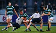 20 January 2025; Patrick Lawlor of St Gerard's School is tackled by St Michael's College players Owen Twomey, left, and Cian O'Neill during the Bank of Ireland Leinster Rugby Boys Schools Senior Cup First Round match between St Gerard’s School and St Michael’s College at Energia Park in Dublin. Photo by Shauna Clinton/Sportsfile