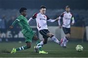 20 January 2025; Brian Wokocha of Usher Celtic and Scott Brady of Dundalk during the Leinster Senior Cup match between Dundalk and Usher Celtic at Oriel Park in Dundalk, Louth. Photo by Ben McShane/Sportsfile