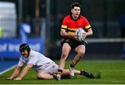 21 January 2025; Charlie Cave of CBC Monkstown evades the tackle of Sean Gillespie of Presentation College, Bray during the Bank of Ireland Leinster Rugby Boys Schools Vinnie Murray Cup Semi-Final match between Presentation College Bray and CBC Monkstown at Energia Park in Dublin. Photo by Tyler Miller/Sportsfile