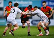 21 January 2025; Cian Kojoy Walsh of CBC Monkstown in action against Daniel Moraghan, left, and Sean McDonald of Presentation College, Bray during the Bank of Ireland Leinster Rugby Boys Schools Vinnie Murray Cup Semi-Final match between Presentation College Bray and CBC Monkstown at Energia Park in Dublin. Photo by Tyler Miller/Sportsfile