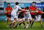 21 January 2025; Cian Kojoy Walsh of CBC Monkstown in action against Daniel Moraghan, left, and Sean McDonald of Presentation College, Bray during the Bank of Ireland Leinster Rugby Boys Schools Vinnie Murray Cup Semi-Final match between Presentation College Bray and CBC Monkstown at Energia Park in Dublin. Photo by Tyler Miller/Sportsfile