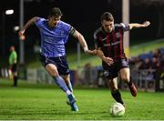 21 January 2025; Dayle Rooney of Bohemians in action against Ronan Finn of UCD during the Leinster Senior Cup match between UCD and Bohemians at UCD Bowl in Belfield, Dublin. Photo by Thomas Flinkow/Sportsfile