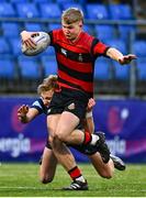 22 January 2025; Ivor Fenton of Kilkenny College is tackled by Alex Tilly of St Vincent’s Castleknock during the Bank of Ireland Leinster Rugby Boys Schools Senior Cup first round match between Kilkenny College and St Vincent’s Castleknock at Energia Park in Dublin. Photo by Shauna Clinton/Sportsfile