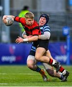 22 January 2025; Ivor Fenton of Kilkenny College is tackled by Ben O'Toole of St Vincent’s Castleknock during the Bank of Ireland Leinster Rugby Boys Schools Senior Cup first round match between Kilkenny College and St Vincent’s Castleknock at Energia Park in Dublin. Photo by Shauna Clinton/Sportsfile