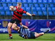 22 January 2025; Ivor Fenton of Kilkenny College is tackled by Alex Tilly of St Vincent’s Castleknock during the Bank of Ireland Leinster Rugby Boys Schools Senior Cup first round match between Kilkenny College and St Vincent’s Castleknock at Energia Park in Dublin. Photo by Shauna Clinton/Sportsfile