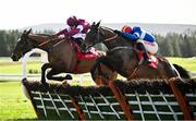 23 January 2025; Coral River, with Danny Mullins up, right, jump the last on their way to winning ahead of Kish Bank, with Sam Ewing up, during the RED MILLS EBF Auction Maiden Hurdle at Gowran Park racecourse in Kilkenny. Photo by David Fitzgerald/Sportsfile