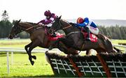 23 January 2025; Coral River, with Danny Mullins up, right, jump the last on their way to winning ahead of Kish Bank, with Sam Ewing up, during the RED MILLS EBF Auction Maiden Hurdle at Gowran Park racecourse in Kilkenny. Photo by David Fitzgerald/Sportsfile