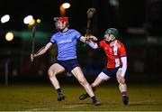 23 January 2025; James Duggan of UCD in action against Fion O'Connell of MTU Cork during the Electric Ireland Higher Education GAA Fitzgibbon Cup round two match between University College Dublin and Munster Technological University Cork at Billings Park in Belfield, Dublin. Photo by Seb Daly/Sportsfile