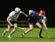 23 January 2025; Darragh Queally of Maynooth University in action against Billy Reid of DCU Dóchas Éireann during the Electric Ireland Higher Education GAA Fitzgibbon Cup round two match between Dublin City University DÉ and Maynooth University at the Dublin City University Sportsgrounds in Dublin. Photo by Thomas Flinkow/Sportsfile